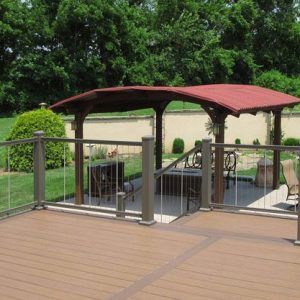 american series aluminum railing on deck in front of pergola